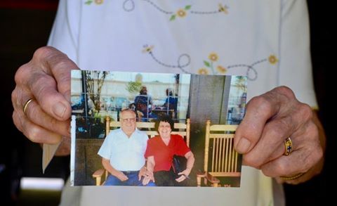 Evelyn Wotipka holds photo of her husband