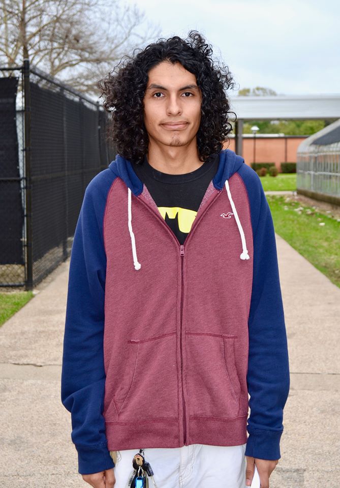 Luis Ruiz stands on Lee College campus