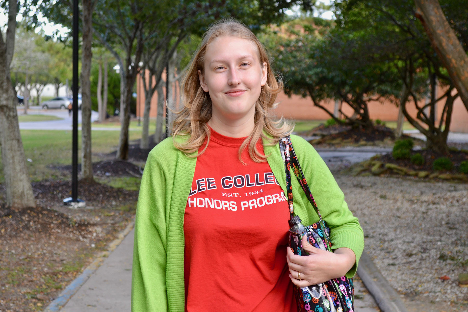 Emily Blumentritt standing on the Lee College campus
