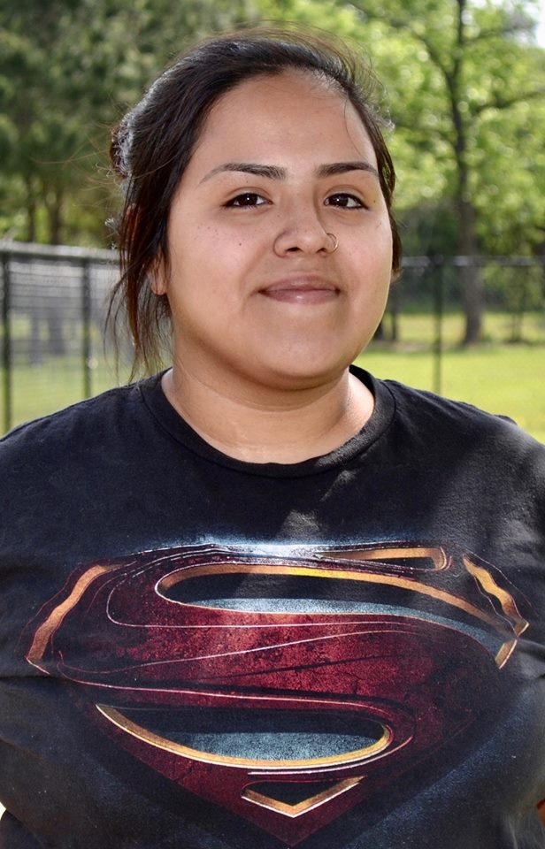 Amanda Rios smiling at dog park