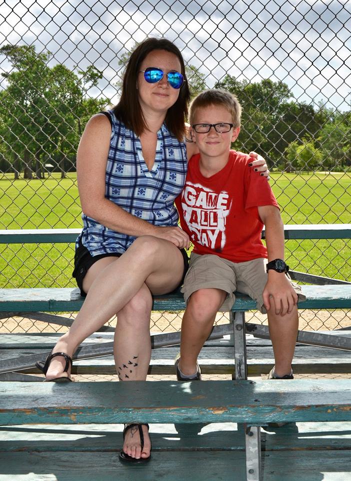 Kim Myers sitting at the skatepark with her son, Bobby