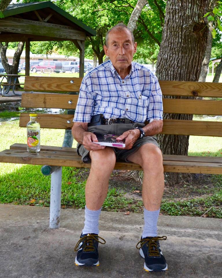 Bill Jones sits on park bench