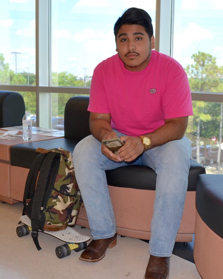 Brandon Galvan sits on bench at Lee College