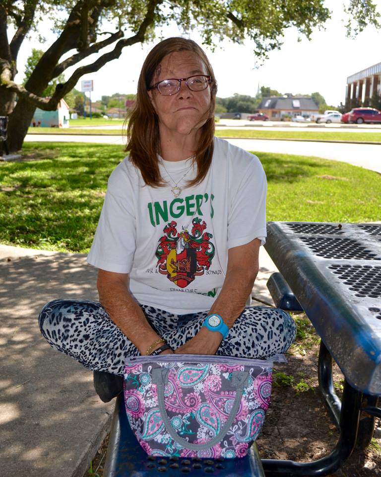 Heather Unger sitting outside library