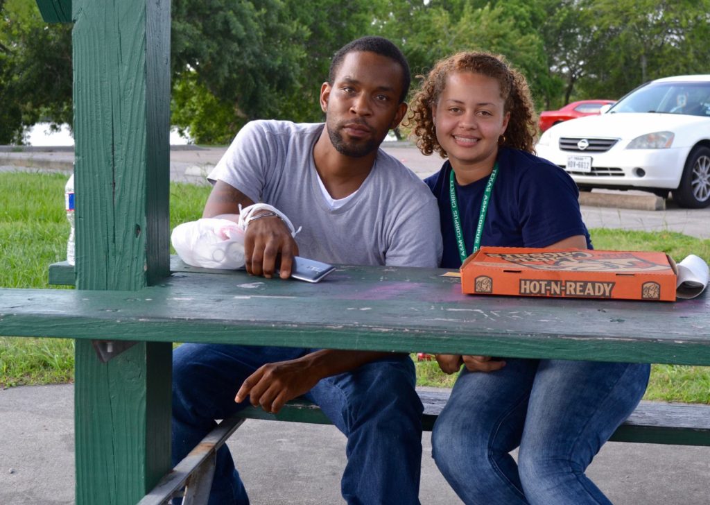 Issac and Rosa sitting at a picnic table