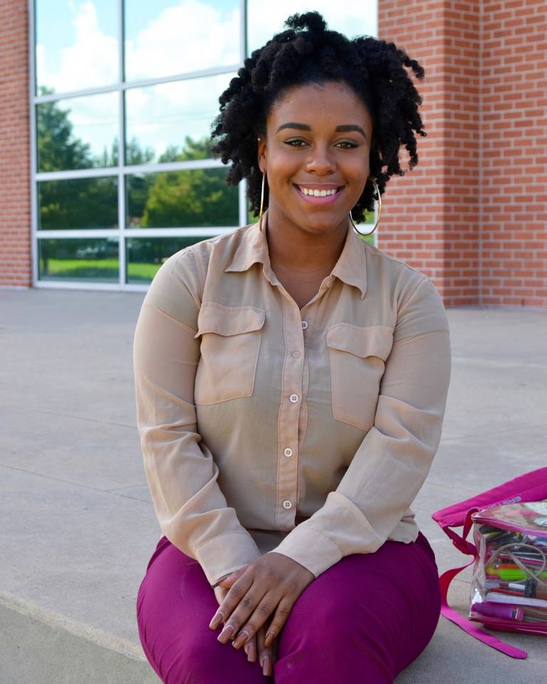 Lorina Semien sits on Lee College campus