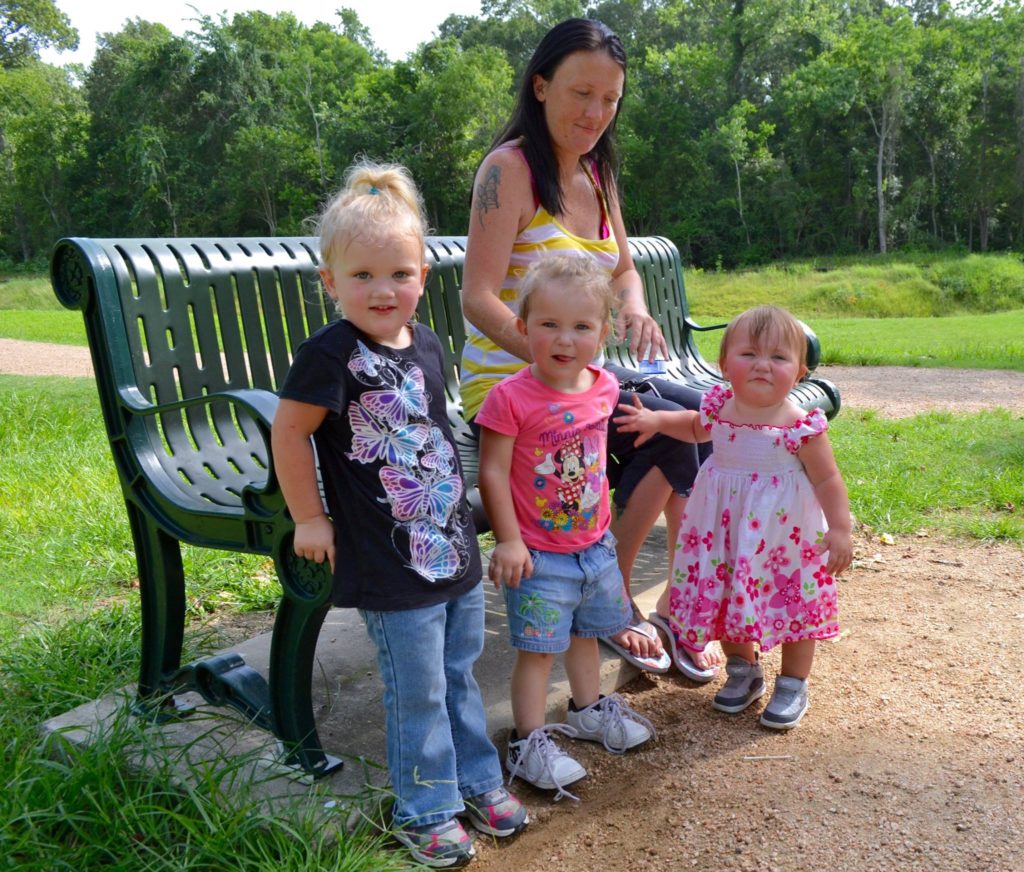 Mom with three daughters at park
