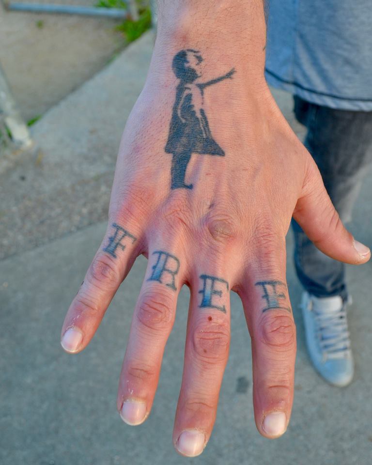 Tattoos on a hand