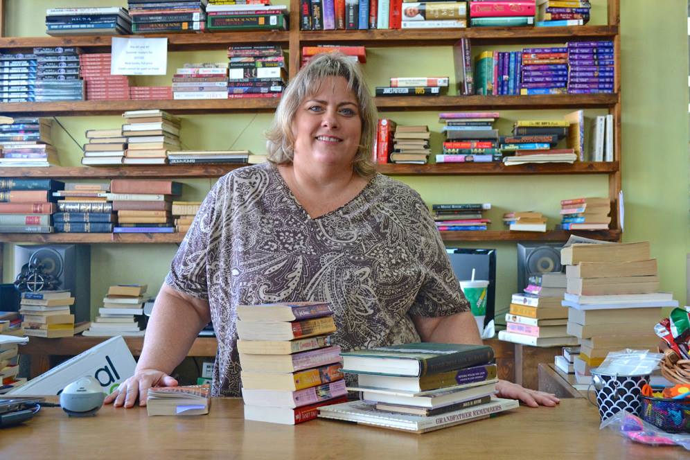 Woman in her book store