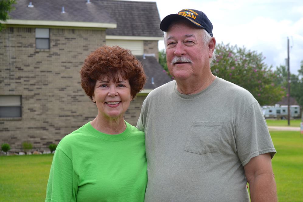 Husband and wife in their yard