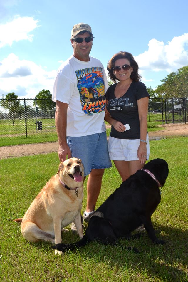 Husband and wife with their two dogs