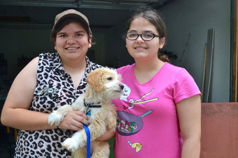 Sisters at garage sale