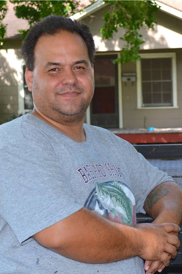 Retired firefighter in his yard