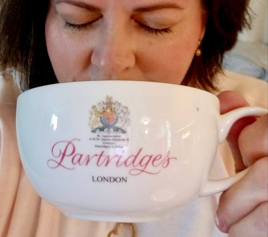 Sarah White drinks tea