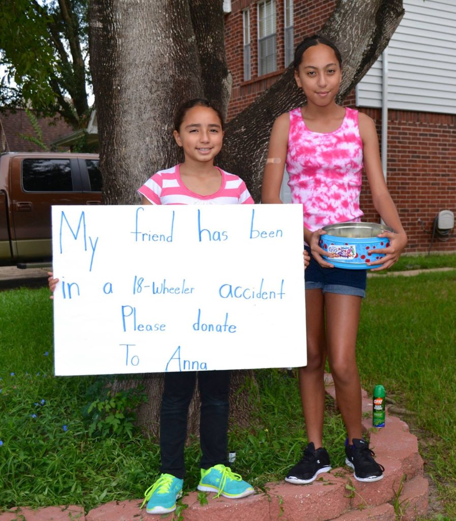 Sisters in yard raising money