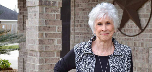 Stella Bird Radle in front of her home