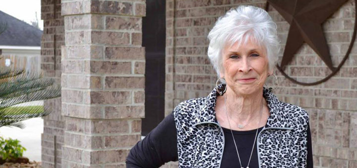 Stella Bird Radle in front of her home