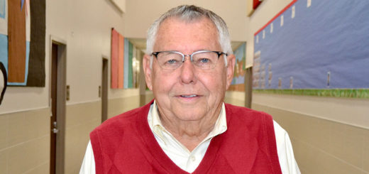 Harvey Oyler in school hallway