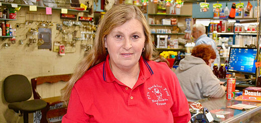 Paula Winters standing in her feed store