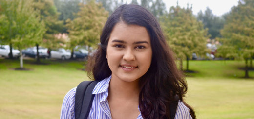 Divya Singh stands outdoors at Lee College