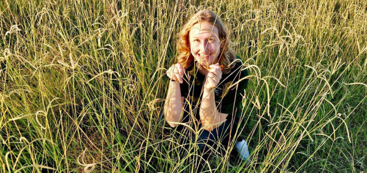 Emily Blumentritt outdoors in field