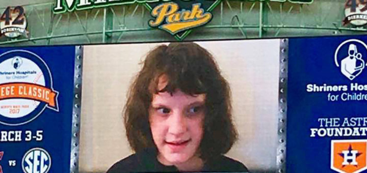 Abigail Huckaby's photo appears on the scoreboard at Minute Maid Park