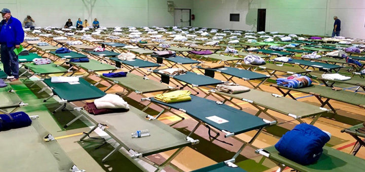Cots at community shelter in church gym