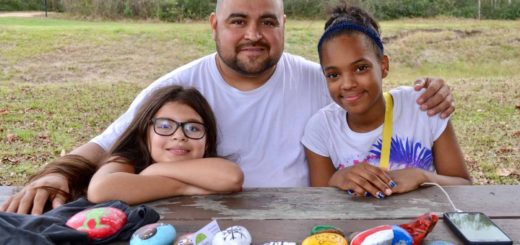 Daniel Oseguera at the park with his daughter and her friend