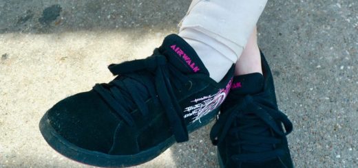 Skateboard shoes on young woman