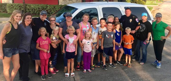 Gay Lynn Milliorn with a group of children