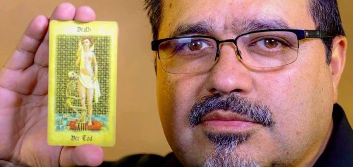 Jamie Salinas holding a card