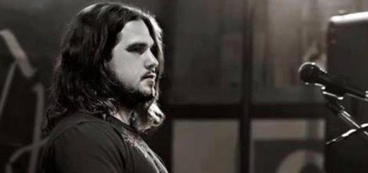 Jeremy Kilgore playing a guitar