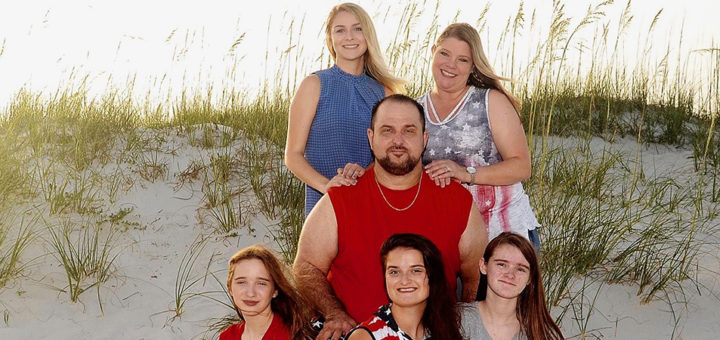 Justin Pedersen and his family at the beach