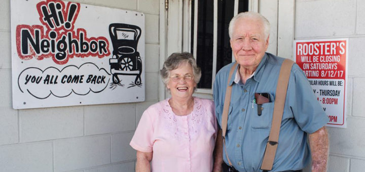 Lowell and Freda Cox stand outside their restaurant, Rooster's