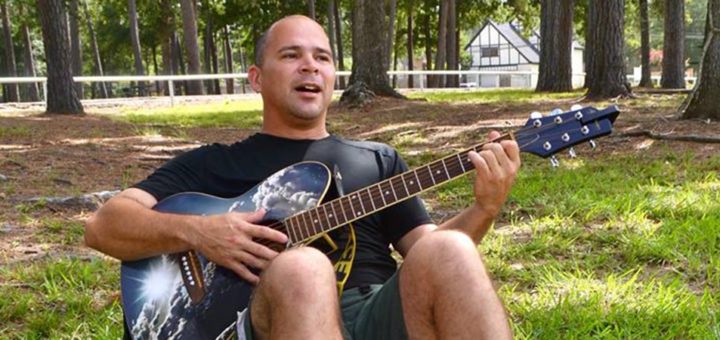 Robert Ortiz playing guitar