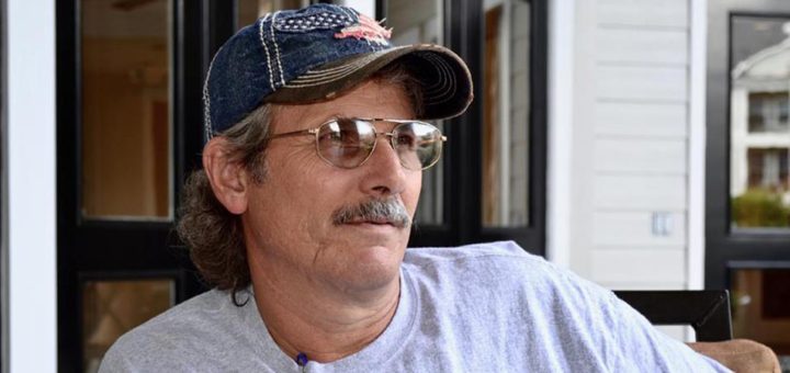 Russell Jenkins sitting at table