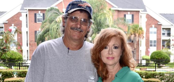 Russell Jenkins stands with his friend, Lisa Edwards