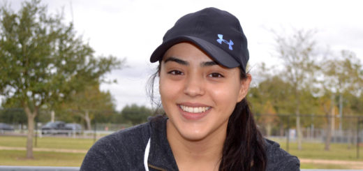 Alex Hernandez smiling while at the dog park