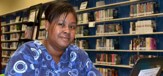 Beverly Speights works at a computer at the library