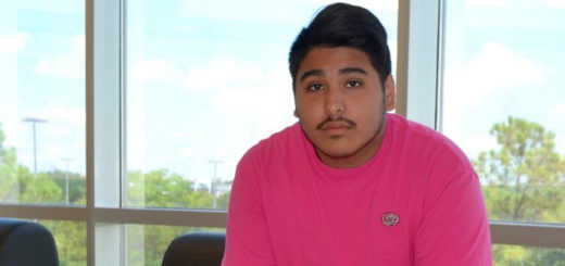 Brandon Galvan sitting on bench