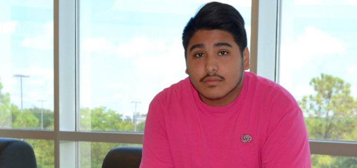 Brandon Galvan sitting on bench