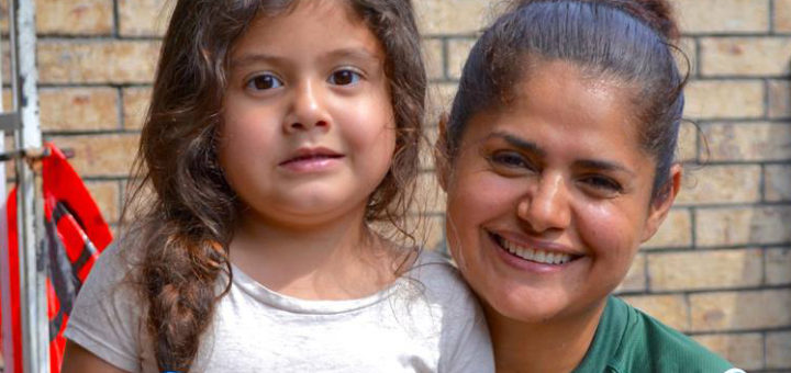 Cathy Arreola with her young daughter