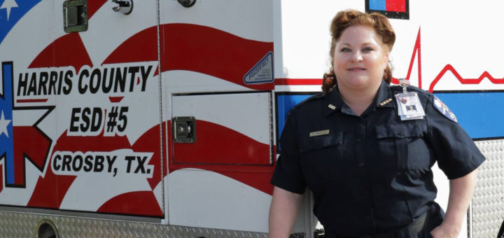 Christy Graves stands near ambulance