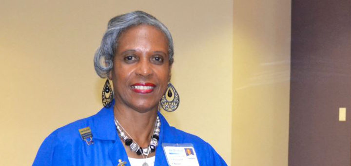 Claudette Barnett wearing her hospital volunteer jacket