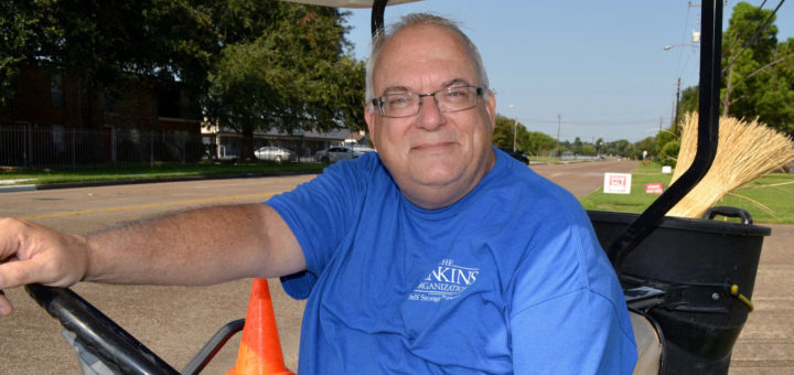 David Dannelley sits in golf cart