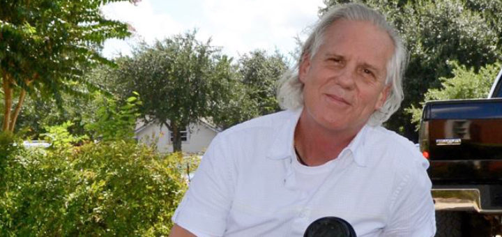 David Hainline sits on bench