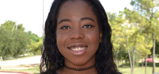 Doris Umezulike stands on Lee College campus