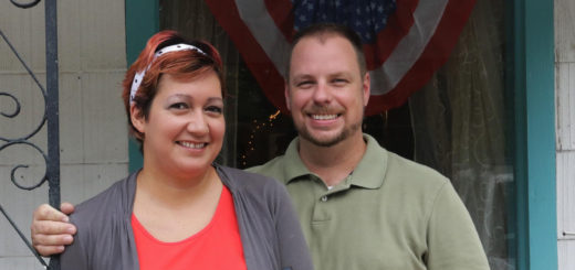 Gabriel Ginn and Andria Flowers on the porch of their store