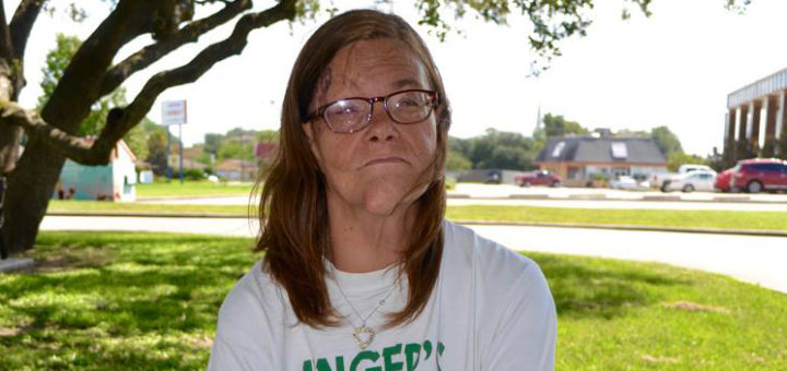 Heather Unger sitting outside library