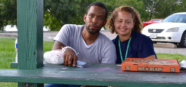 Issac and Rosa sitting at a picnic table